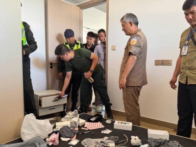 金边警方突袭公寓，两名中国籍男子涉诈落网