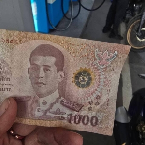 湄索市出现假钞！识别技巧：触摸、透视、倾斜